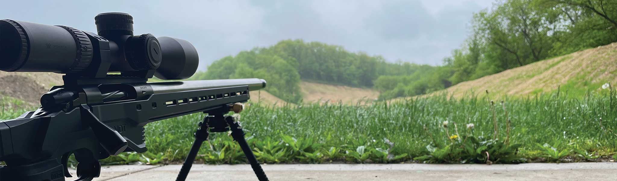 A rifle with sight at a shooting range