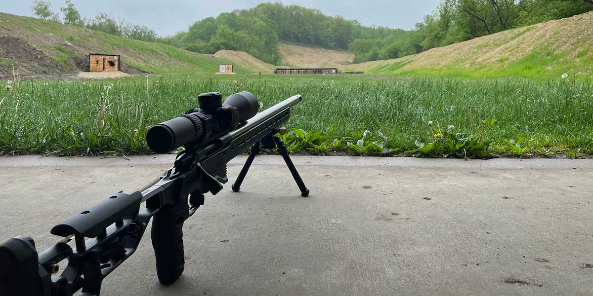 A rifle with sight at a shooting range